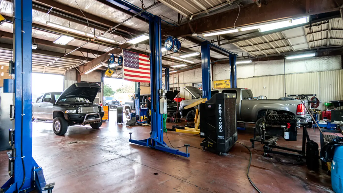 Adrenaline Diesel repair shop with trucks on lifts